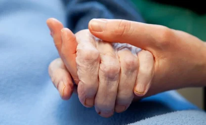 1444x920_a-young-hand-touches-and-holds-an-old-wrinkled-hand-4148r-706.webp