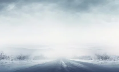 snowy-road-disappears-into-foggy-winter-landscape_157027-4463.avif
